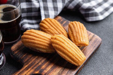 Madeleine biscuit cookies sweet French dessert meal food snack on the table copy space food background top view
