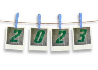 Four  plastic clothespins and instant frame with 2023 text for pictures
