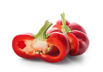 Halves of red bell pepper on white background