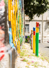 Brightly colored graffiti on building exteriors in Lisbon, Portugal
