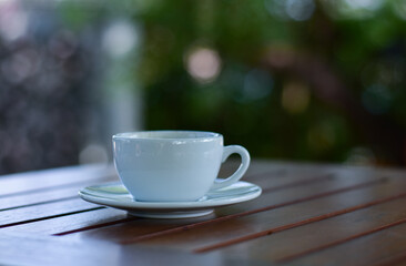 Black coffee is hot coffee in a white cup.
