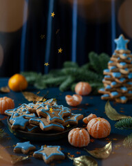 Homemade Gingerbread cookies Christmas Trees, decorated with icing and sugar decorations.