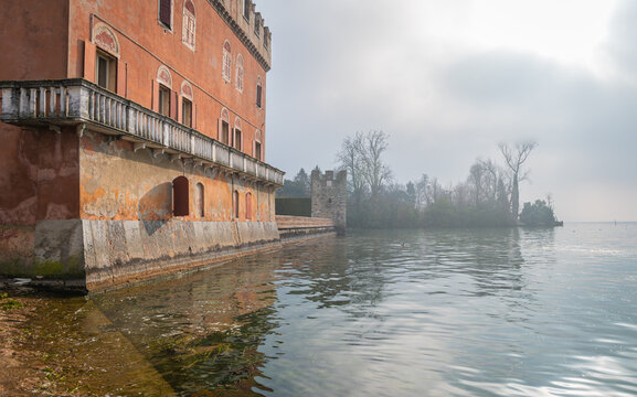 Historic building (Dogana Veneta) - is a monumental 14th-century building located in the historic downtown of Lazise on Garda Lake, Verona Province, northern Italy, january 21, 2022