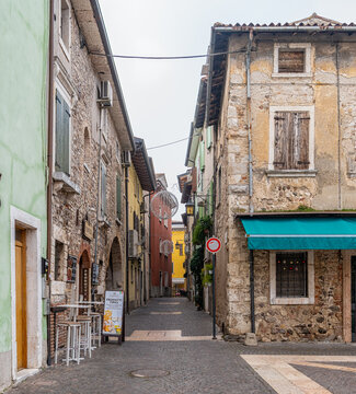 Historic centre of the picturesque town of Lazise on Lake Garda in the winter season. Lazise, Verona province, northern Italy - January 21, 2022