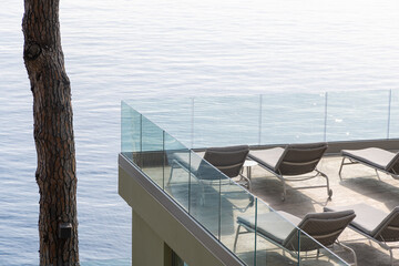 Terrace with bathing buns facing Mediterranean sea  in Camogli, a fishing village and resort close to the peninsula of Portofino, in the Riviera di Levante, Genoa Liguria Italy