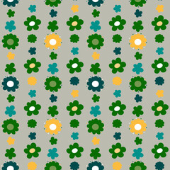 A pattern of flowers with rounded petals arranged in vertical stripes. Yellow and green colors. Seamless vector image on a gray background.