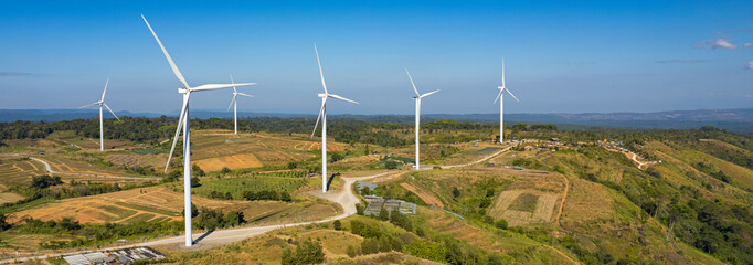 wind turbines in a field, wind turbine farm sundown, Wind Power Turbines in a rural area, Tracking...