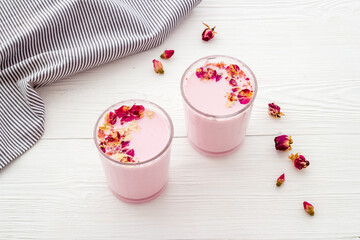 Pink matcha latte coffee or tea with milk, top view