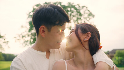 Young adult asia people fiance happy lover flirt fall in love nose kiss hug cuddle care trust....