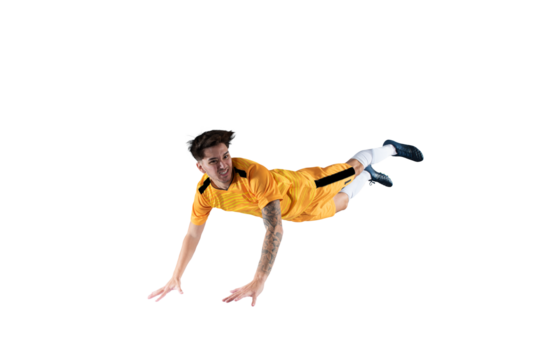 Football striker  player with yellow team suit jumps