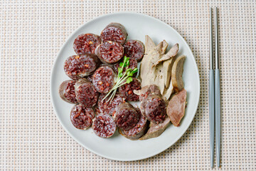 Sundae, Korean Blood Sausage : Pork intestines stuffed with glass noodles, vegetables, sweet rice,...