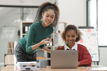 African American girls students studying up for test or making homework together, Back to school concept.