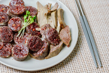Sundae, Korean Blood Sausage : Pork intestines stuffed with glass noodles, vegetables, sweet rice,...