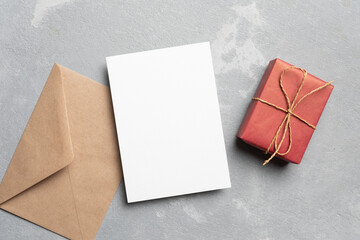 Greeting card mockup with envelope and gift box