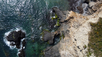 The coast of the Celtic Sea from a bird's-eye view. The rocky shores of Ireland. Drone point of view.