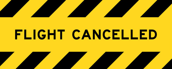 Yellow and black color with line striped label banner with word flight cancelled