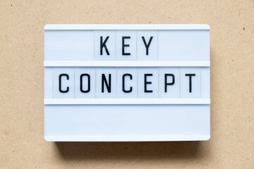 Lightbox with word key concept on wood background