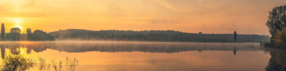 Obraz na płótnie Canvas Sunrise on river