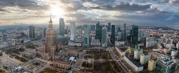 Naklejka na ściany i meble Aerial view of Palace of Culture and Science and downtown business skyscrapers in Warsaw, Poland.