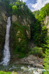 Naklejka na ściany i meble Liechtenstein Gorge near Sankt Johann in Austria, With Waterfalls a Wildwater Stream and Rocks.