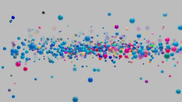 Dynamic animation of spheres of different colors moving randomly in space create a beautiful abstract simulation for the background with a bokeh effect