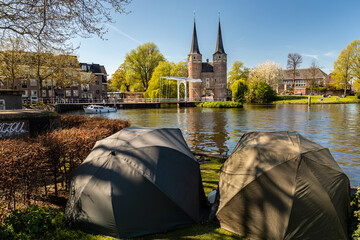 Twin tours and brick archway of the 15th century Delft, Netherlands city gate
