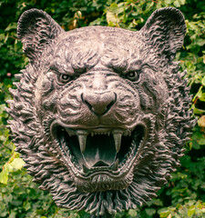 Bronze head of a snarling lion