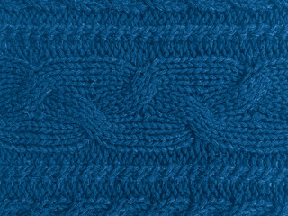 Handmade knitted background with detail wool threads.