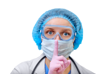 A doctor in a protective mask and clothes from a coronavirus put a finger to her lips with a gesture of secret, isolated on a white background. Nurse on a in pink medical gloves.