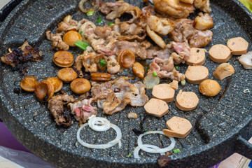 Obraz na płótnie Canvas Meat and Vegetables Grill Cooking on All You Can Eat Iron Grilling Pan
