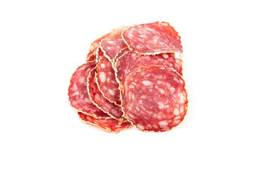 Slices of salami sausage on a white background