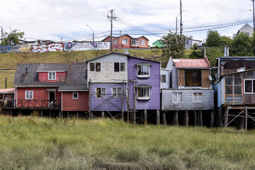 Fototapeta na wymiar Palafitos de Pedro Montt - colorful stilt houses on Chiloé (Isla Grande de Chiloé) in Chile 
