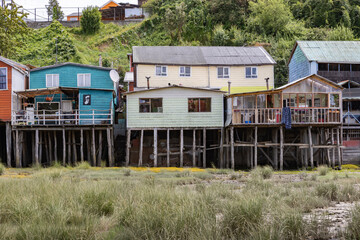 Fototapeta na wymiar Palafitos de Pedro Montt - colorful stilt houses on Chiloé (Isla Grande de Chiloé) in Chile 
