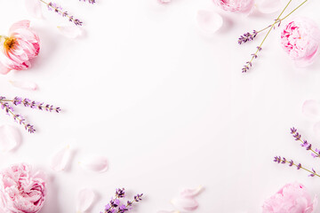 Obraz na płótnie Canvas Frame of lavender flowers and pink rose, banner, spa, beauty concept
