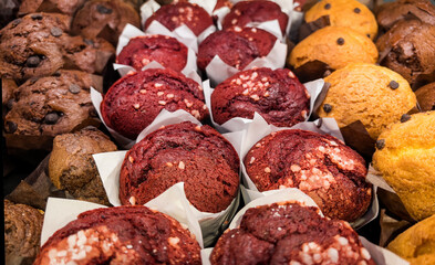Chocolate and vanilla muffins in bakery 