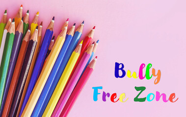 Colorful pencils and Bully free zone   message.  No bullying at schools concept 