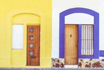 Front view of a colorful  front doors 