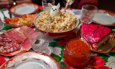 Traditional Russian New Year's table. Salads and cold cuts.