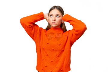 Young blonde woman over isolated chroma key background frustrated and covering ears