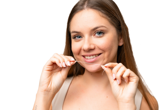 Young blonde woman over isolated chroma key background using dental floss with happy expression. Close up portrait - Powered by Adobe