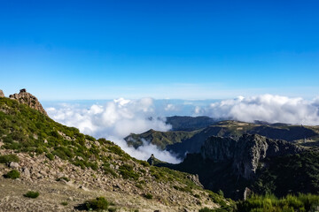 Fototapeta na wymiar Clouds over the peak in Madeira island 