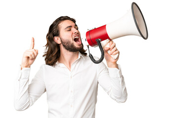 Young handsome man over isolated chroma key background shouting through a megaphone to announce...