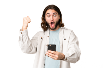 Young handsome man over isolated chroma key background surprised and sending a message