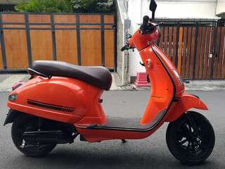 Orange automatic scooter
