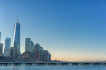 Obraz premium Cityscape with New York. Hudson River in Foreground, Trade Center and Manhattan in Background. NYC, USA