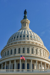 Fototapeta na wymiar Washington Capitol Building and Waving USA Flag.