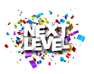 Next level sign over cut out foil ribbon confetti background.