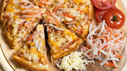 Homemade crab sticks Pizza, Hot pizza big slices of cheese for lunch or dinner topped with crab sticks, Template with delicious, Promotional poster for restaurant or pizza sale, Text space.