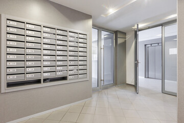 mailboxes in the lobby of an apartment building