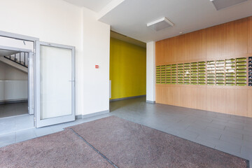mailboxes in the lobby of an apartment building